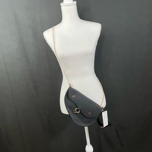 Black crossbody saddle bag with detachable strap NWT